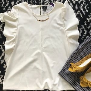 Cream ruffle cap sleeve top